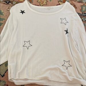 White Long Sleeve Top with Black Star Accents